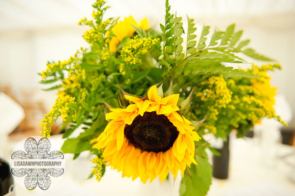 wedding decorated Yellow table plan Sunflower table centrepieces