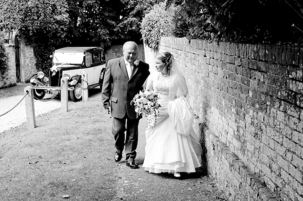 Charlotte & her father make their way to church