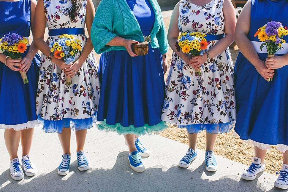 Fifties floral bridesmaids in converse