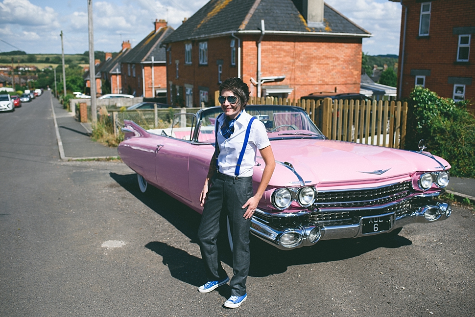 pink cadallac wedding car