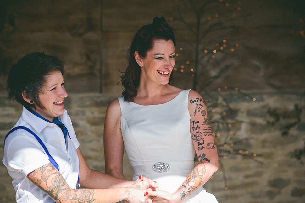 wedding ceremony tattooed bride