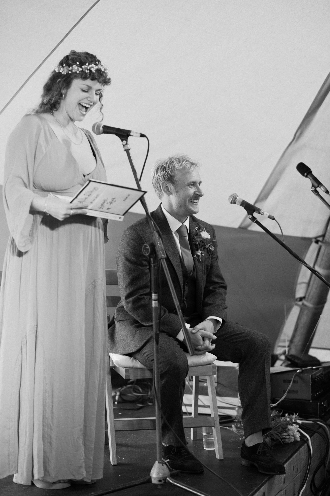 Hannah reading from a booklet during the ceremony
