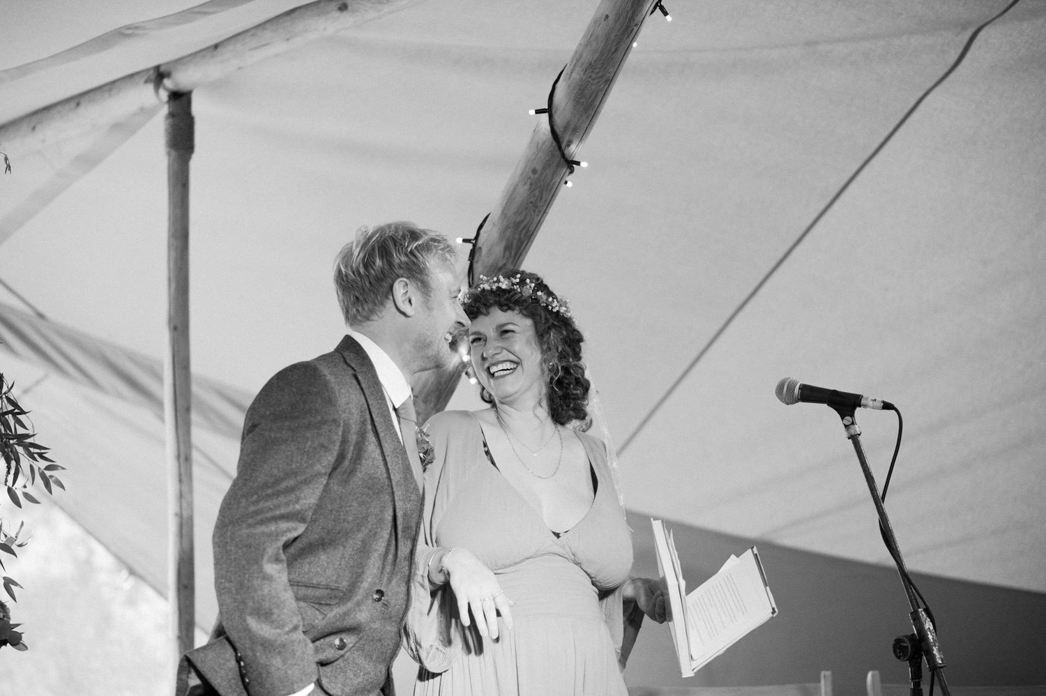 Hannah and Alex sharing a laugh during their tipi ceremony