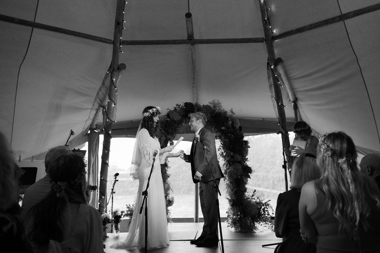Hannah and Alex sharing a kiss during the ceremony