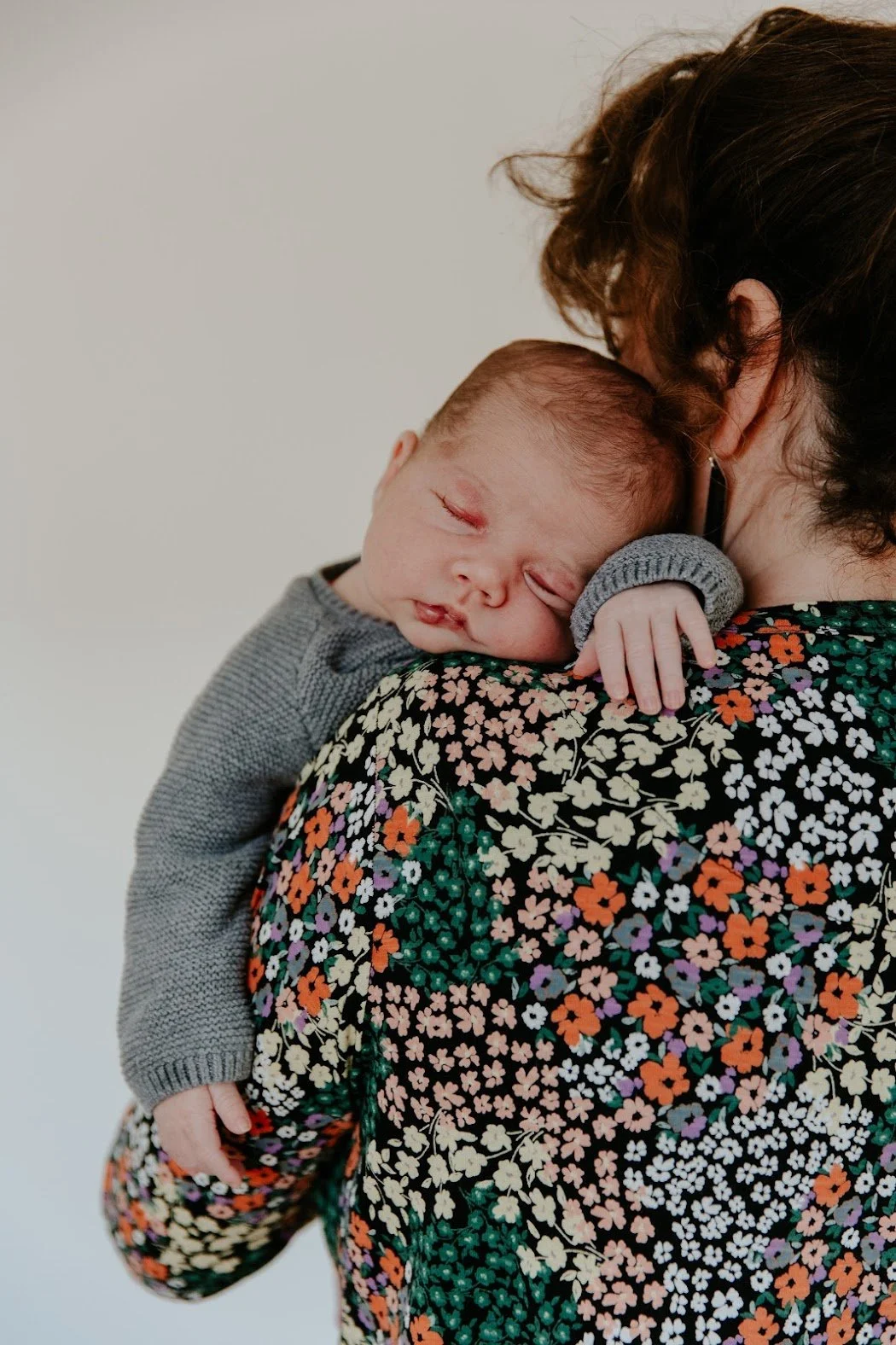 Lisa holding her baby boy