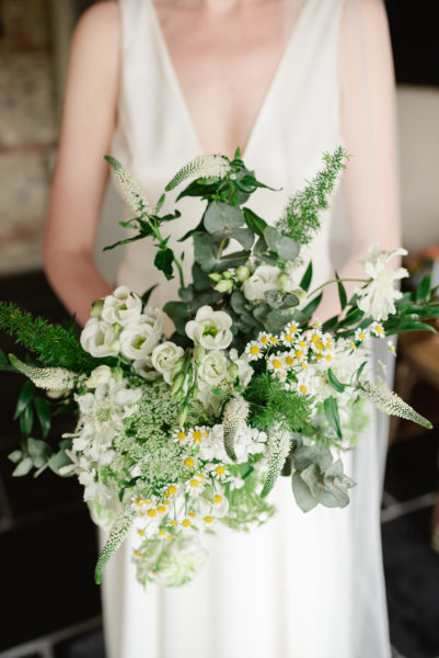 Bride holding white bouquet